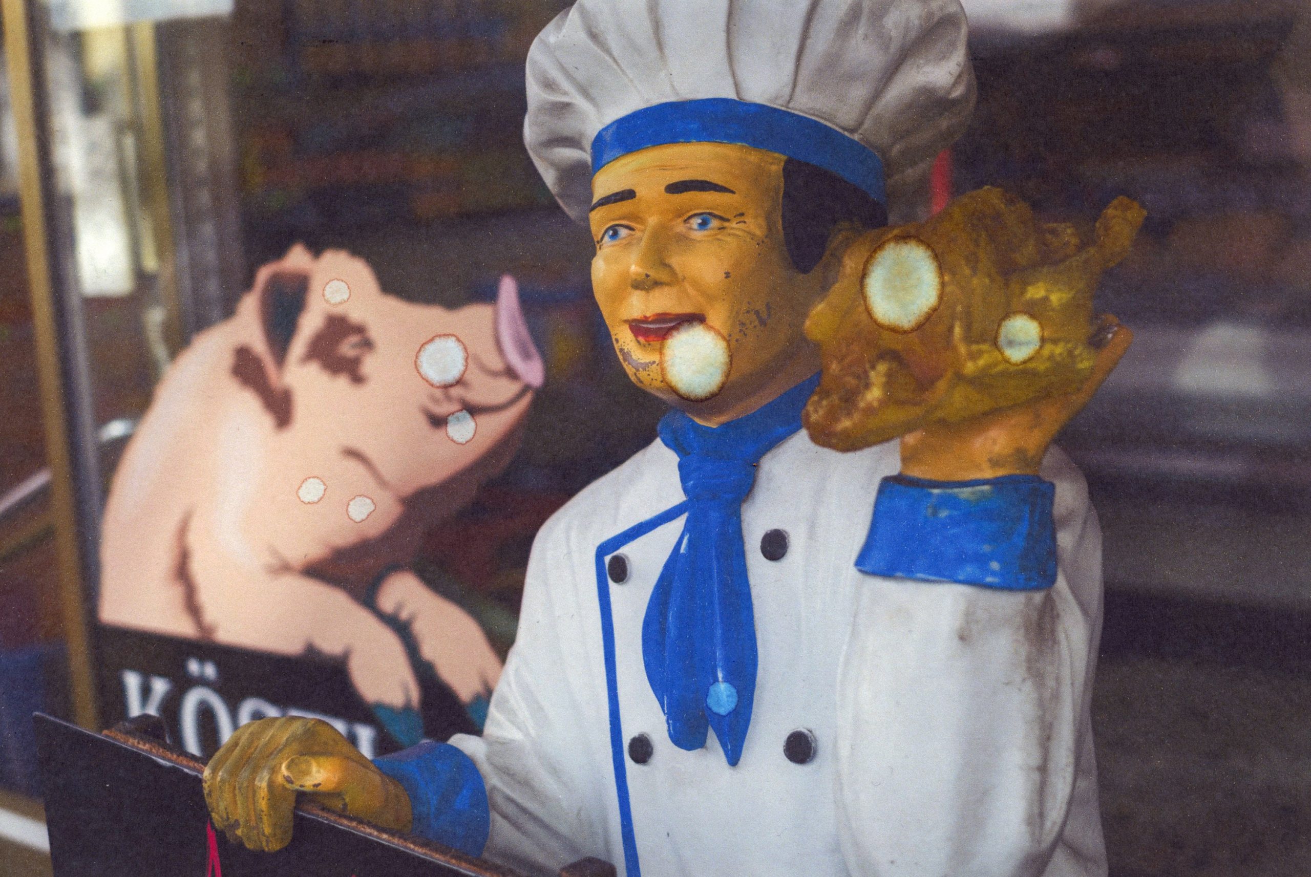 Restaurant sign with a pig