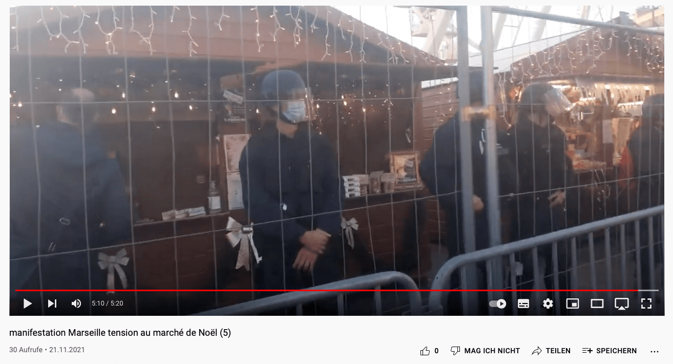 Video-Screenshot von Polizisten auf einem Weihnachtsmarkt in Marseille