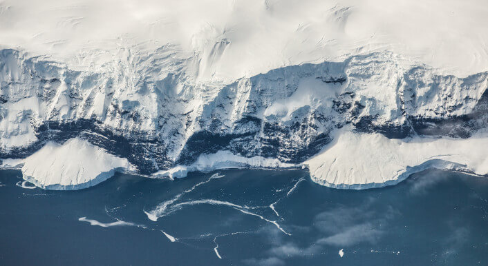 Die Eisschilde in der Antarktis und in Grönland haben einen Einfluss auf den Meeresspiegel