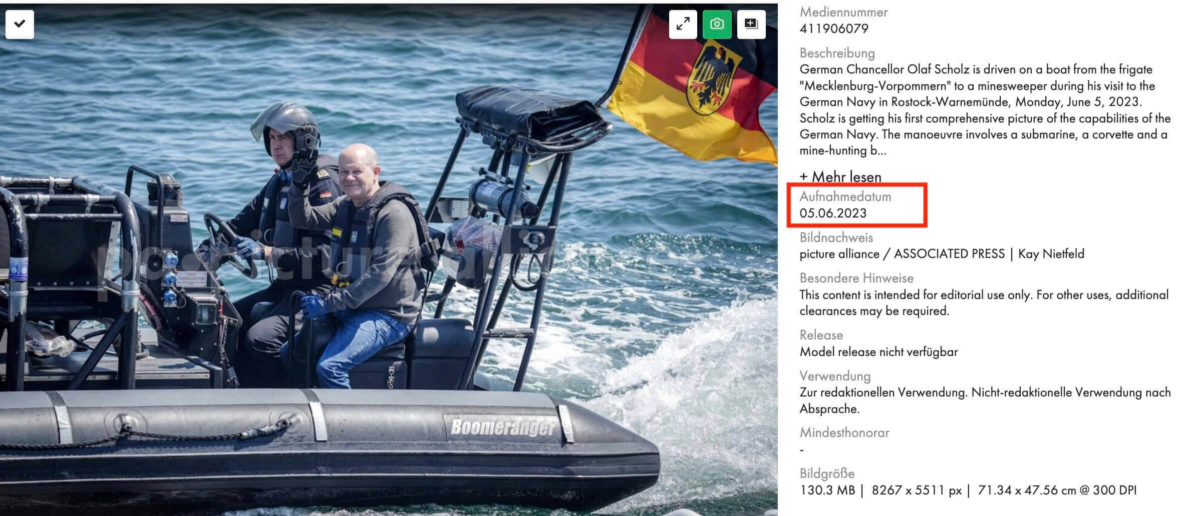 Bundeskanzler Olaf Scholz wird bei seinem Besuch der Deutschen Marine in Rostock-Warnemünde am Montag, 5. Juni 2023, auf einem Boot von der Fregatte "Mecklenburg-Vorpommern" zu einem Minensuchboot gefahren. Das Boot hat den Namen Boomeranger, Scholz lächelt und winkt. Als Aufnahmedatum ist in der Bilddatenbank der 5. Juni angegeben.